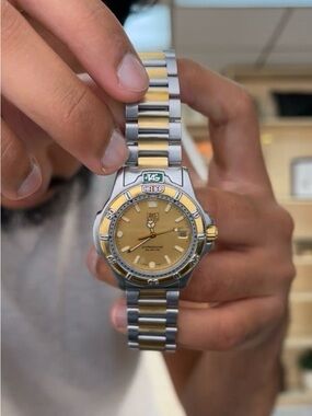 Tag Heuer Two-Tone Watch with Yellow Dial and Gold Accents